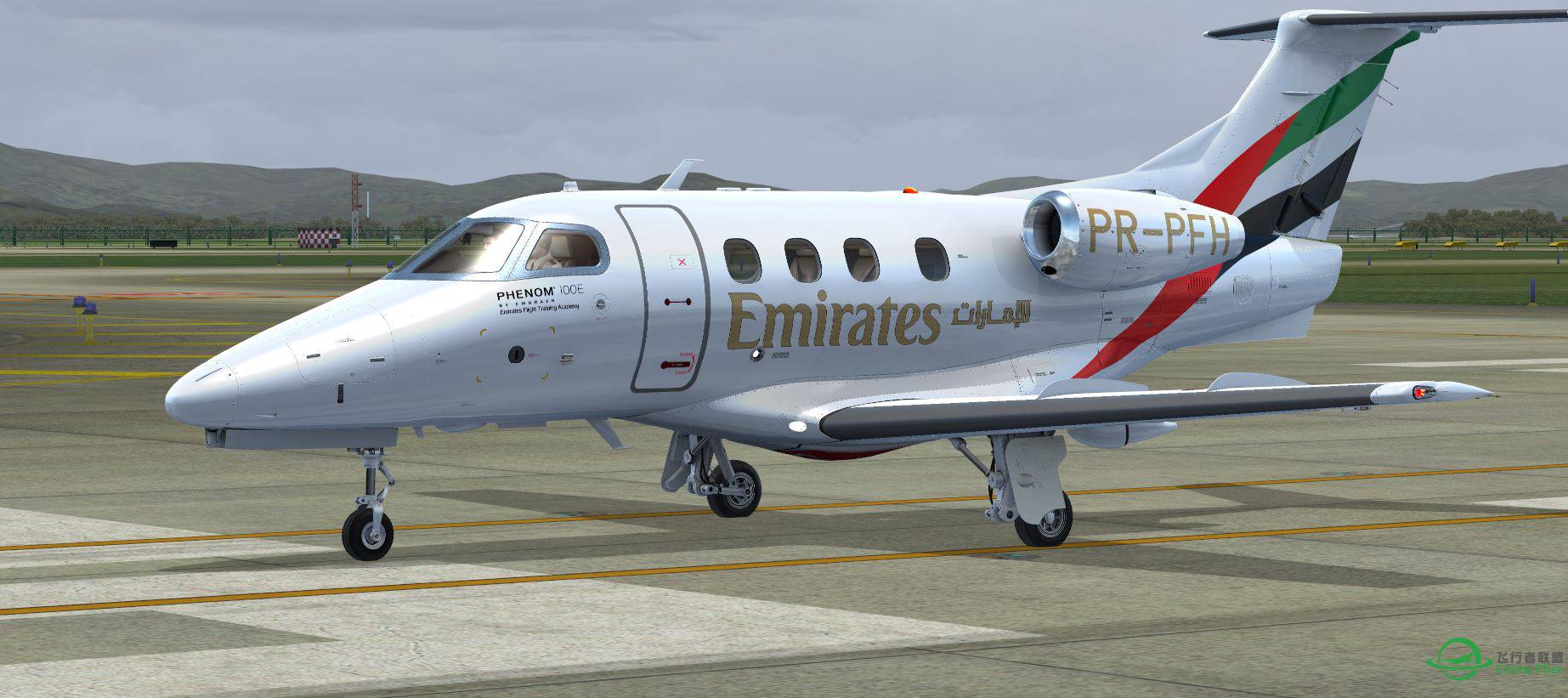 Phenom 100 Emirates @ ZGGG-8479 